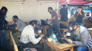 Protestors -working-in-gas-masks